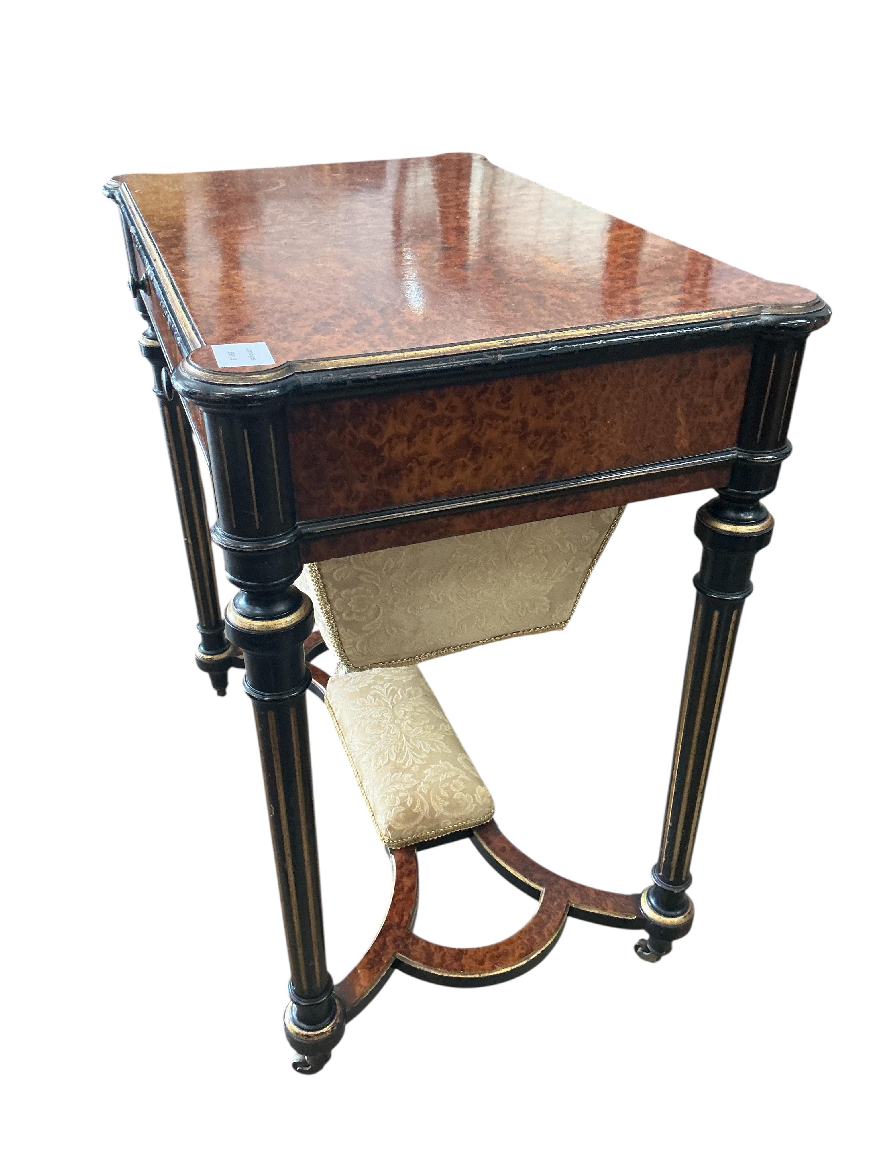 A late 19th century parcelgilt and ebonised amboyna work table, width 68cm, depth 44cm, height 72cm